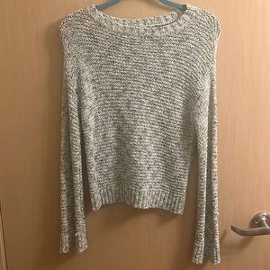 loose fitting knit sweater, extra small but fits like a small.